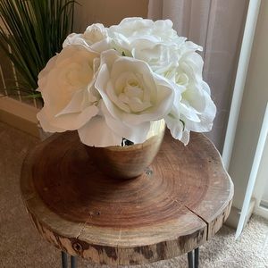 Faux white roses in silver vase